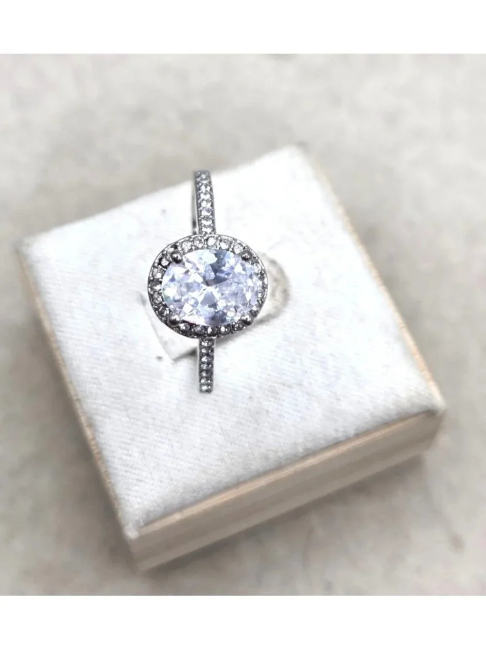 Oval Shape Faux Diamond Solitaire RIng With CZ Accents Size - 10